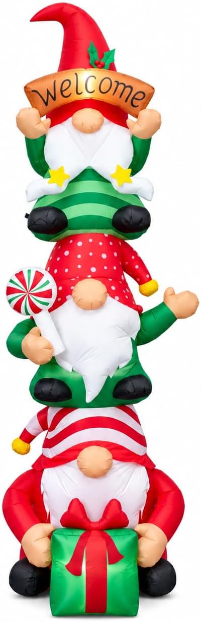 Three stacked gnome inflatables in red and green hats with a Welcome sign and a gift