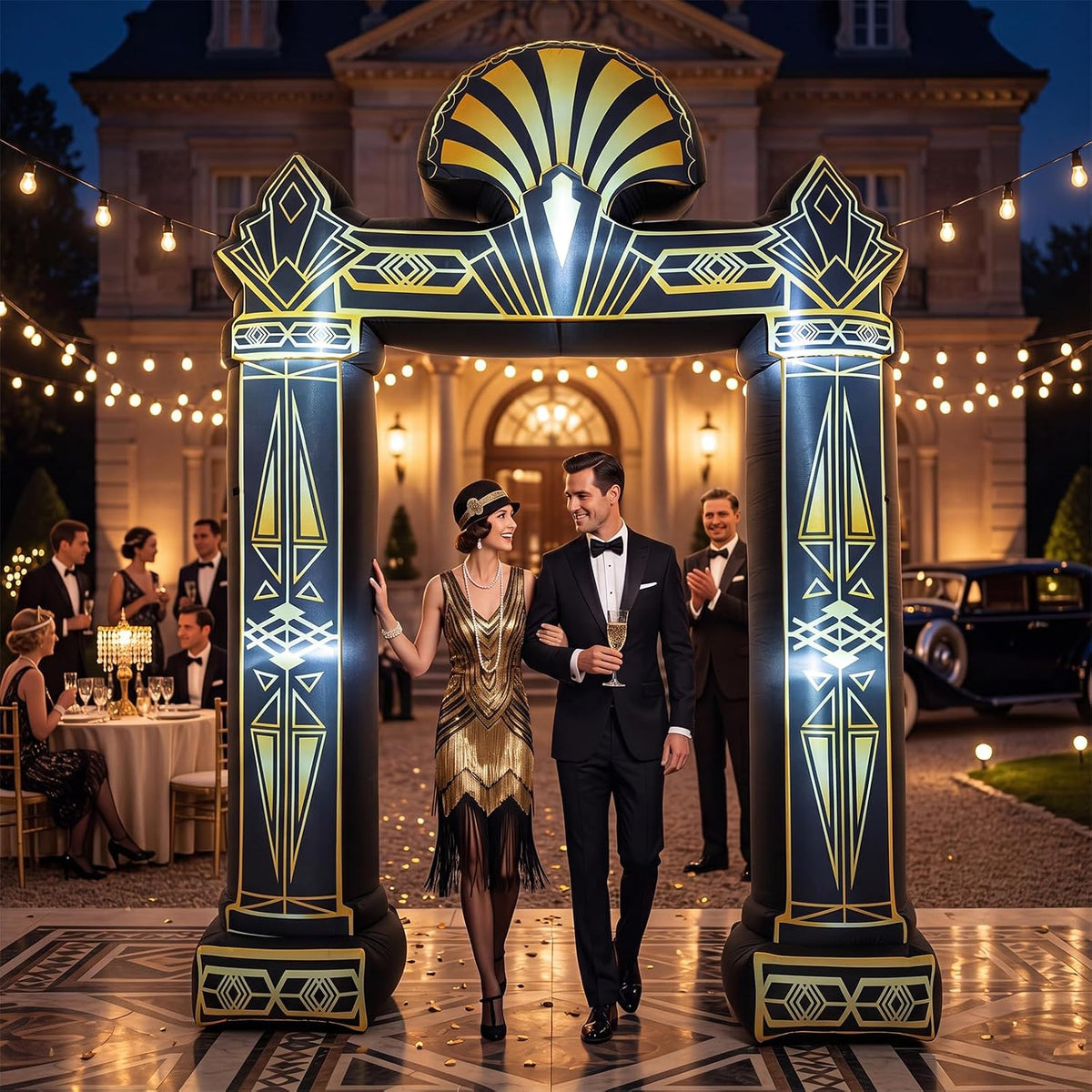 Black and gold Art Deco inflatable arch with a fan crest at a 1920s themed party entrance