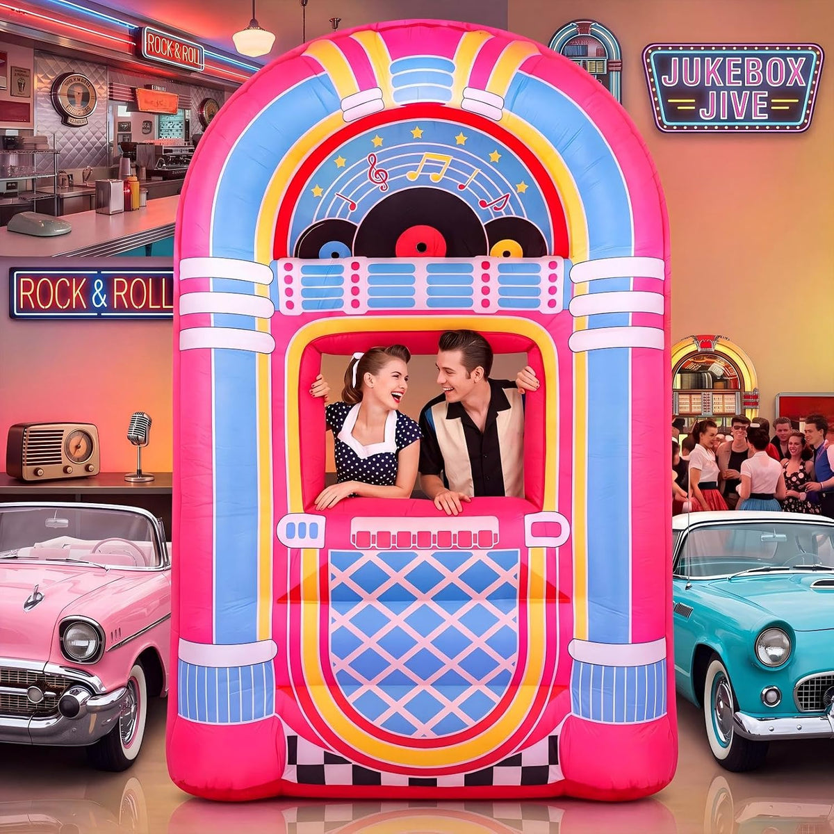 Pink and blue jukebox inflatable with a couple posing in the photo window at a 50s diner party