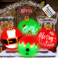 Four glowing inflatable ornament balls with Santa, elf and Merry Christmas designs and a remote