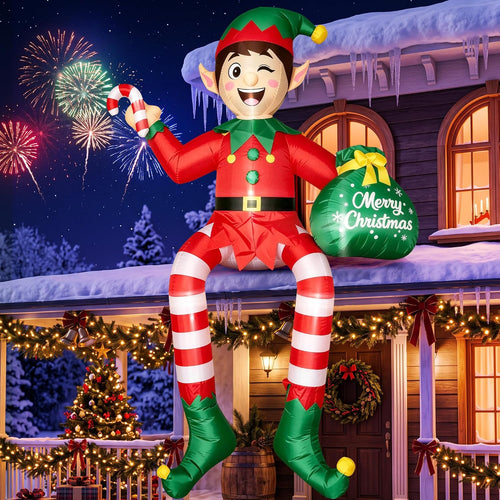 Giant elf inflatable with striped legs sitting on a snowy roof edge holding a candy cane and gift sack