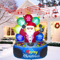 Santa in sunglasses at a round Merry Christmas DJ deck inflatable with colorful ornament speakers in the snow