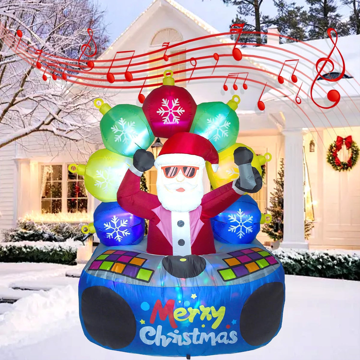 Santa in sunglasses at a round Merry Christmas DJ deck inflatable with colorful ornament speakers in the snow